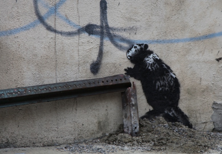 Banksy's self-destructing painting sells for over $25 million, setting  auction record